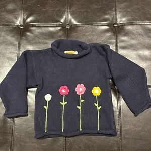 Kids Claver roll neck sweater, navy blue with flowers size 4T.